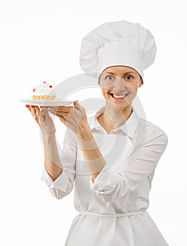 Beautiful woman chef cook showing cake