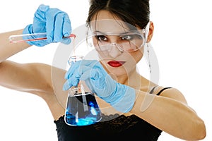 Beautiful woman with chemical glassware