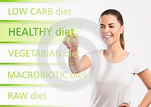 Beautiful woman choosing a healthy diet plan