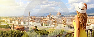 Beautiful woman in the city of Florence birthplace of the Renaissance. Panoramic banner with pretty girl enjoying view of Florence