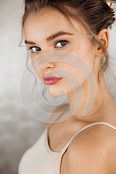 Beautiful woman with clean skin on her face. Pretty girl with natural make-up