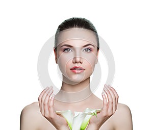 Beautiful woman with clear skin and flowers isolated on white. Skincare and facial treatment concept