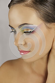 Beautiful woman with colorful makeup