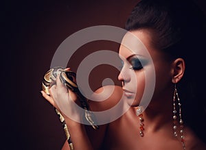 Beautiful Woman with dangerous snake