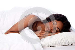 Beautiful woman deeply asleep and dreaming photo