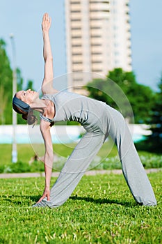 Beautiful woman doing stretching exercise