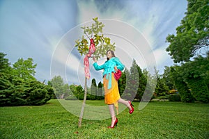 Beautiful woman dreaming on a field