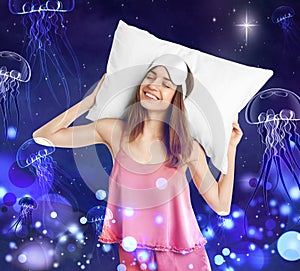 Beautiful woman dreaming about underwater world while sleeping, night starry sky with full moon on background