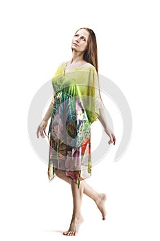 Beautiful woman in dress elegantem in the Studio