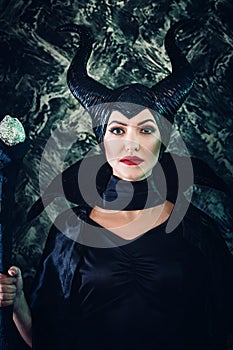 Beautiful woman dressed as Maleficent