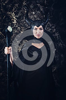 Beautiful woman dressed as Maleficent