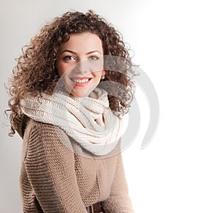 Beautiful woman dressed in winter clothes smiling