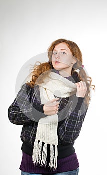 Beautiful woman dressed in winter clothes smiling - studio shots