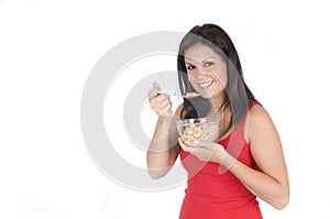 Beautiful woman eating her breakfast