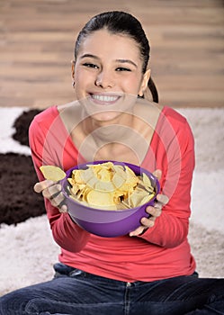 Beautiful woman eating junk food