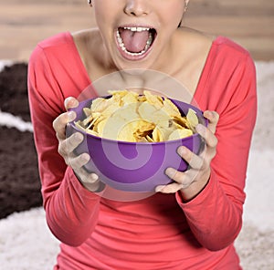 Beautiful woman eating junk food