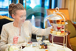 Beautiful woman enjoying afternoon tea