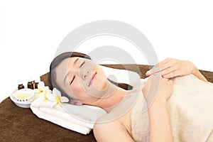 Woman relaxing at spa salon