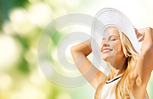 Beautiful woman enjoying summer outdoors