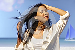 Beautiful woman enjoying summer sun