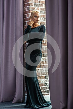 Beautiful woman in evening black dress