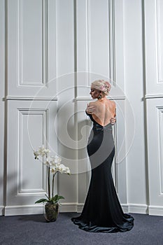 Beautiful woman in evening black dress