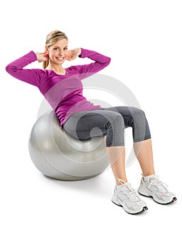 Beautiful Woman Exercising On Fitness Ball