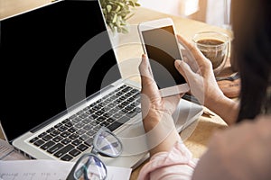 Beautiful Woman Explore Online Shopping Website. Close up hands of young woman shopping online by using laptop and reading online