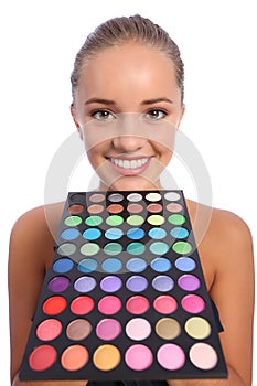 Beautiful woman with eyeshadow colour 60 palette