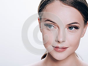 Beautiful woman face with eyelashes beauty healthy skin natural makeup