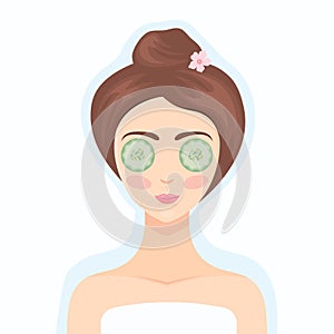 Beautiful woman with facial mask of cucumber slices on face. Beauty treatment. Cosmetic product. Spa mask for the skin care. Home