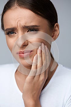 Beautiful Woman Feeling Tooth Pain, Painful Toothache. Health