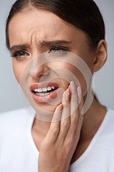 Beautiful Woman Feeling Tooth Pain, Painful Toothache. Health