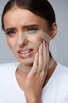 Beautiful Woman Feeling Tooth Pain, Painful Toothache. Health