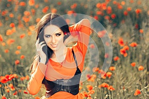 Beautiful Woman in a Field of Poppies