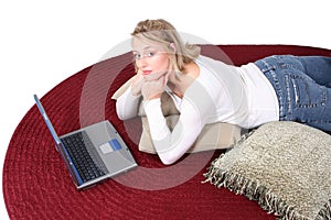 Beautiful Woman on Floor with Laptop Computer