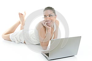 Beautiful woman on floor with laptop computer