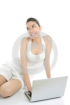 Beautiful woman on floor with laptop computer