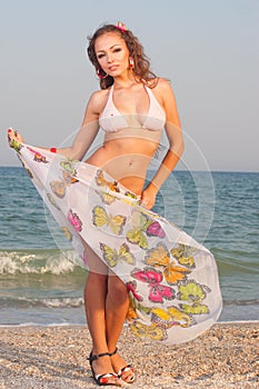 beautiful woman flower in the head in bikini