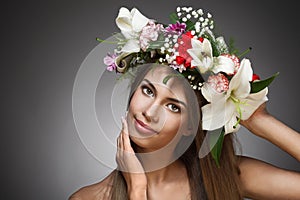 Beautiful woman with flower wreath