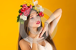 Beautiful woman with flowers on head