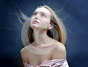 Beautiful woman with flying long hair.