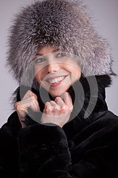 Beautiful woman in a fur hat