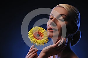 beautiful woman with gerber flower