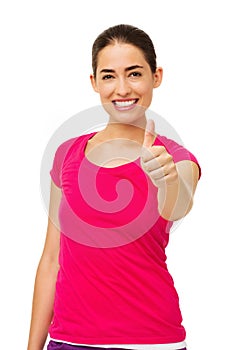 Beautiful Woman Gesturing Thumbs Up Over White Background