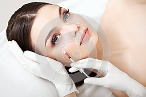Beautiful Woman gets Injection In Her Face. Cosmetic Surgery