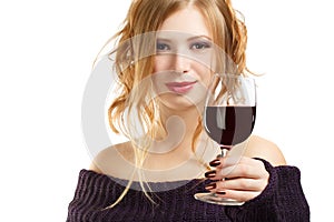 Beautiful woman with glass of red wine