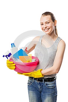 Beautiful woman in gloves with basin over white