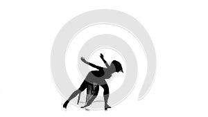 Beautiful woman go on dance modern contemporary style on white, silhouette, slow motion