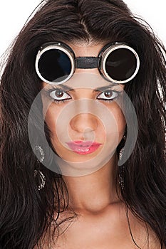 Beautiful woman in goggles close-up